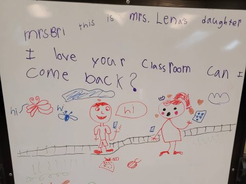 photo of whiteboard with child drawings